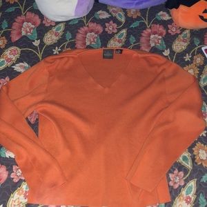 orange v neck sweater